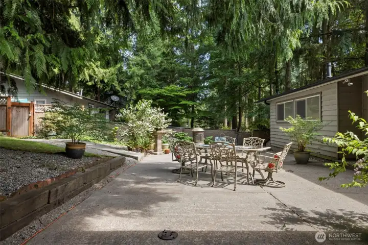 This fully fenced yard offers plenty of places to relax and unwind!