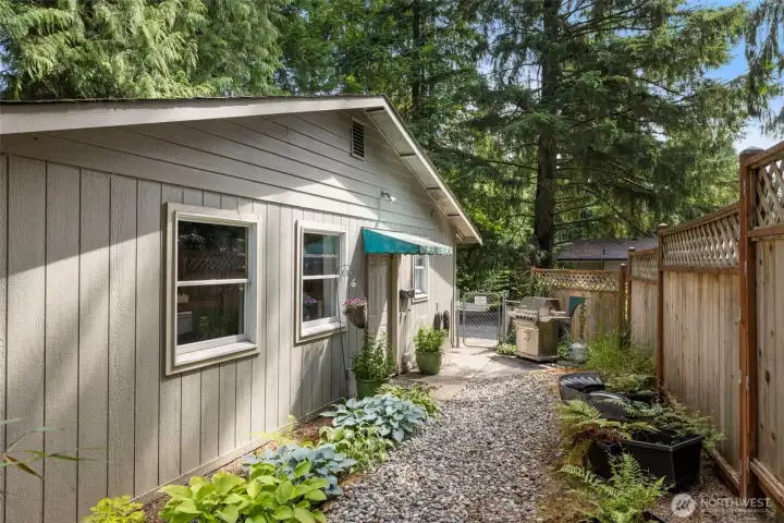 Side yard for the DADU Studio apartment. Currently rented for $1650/mth! The current tenant would LOVE to stay if able!
