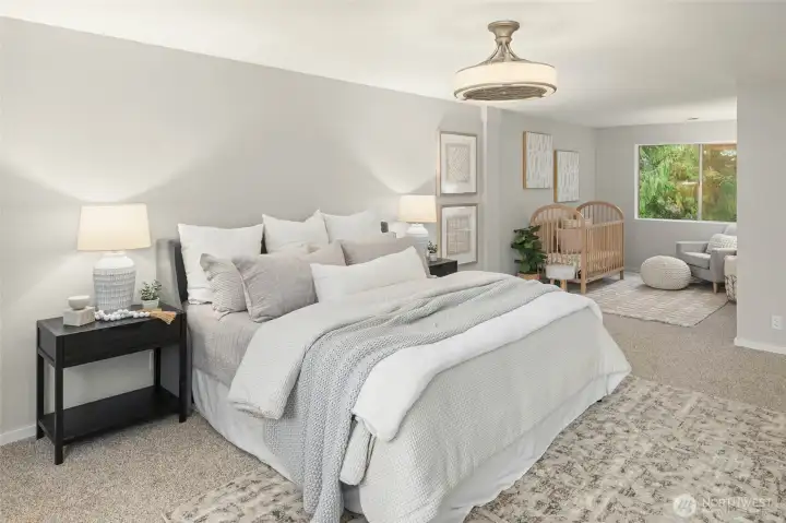 Generously sized primary suite on upper level with versatile nook.