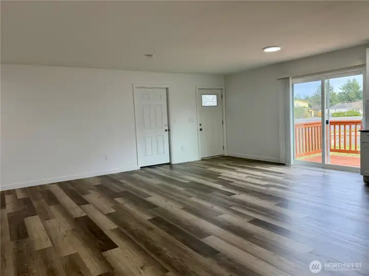 Great room with sliding doors.  Light-filled!