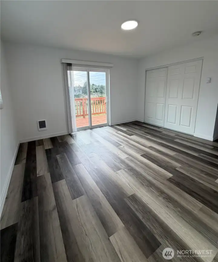 Primary BDR with sliding doors.  Light-filled!