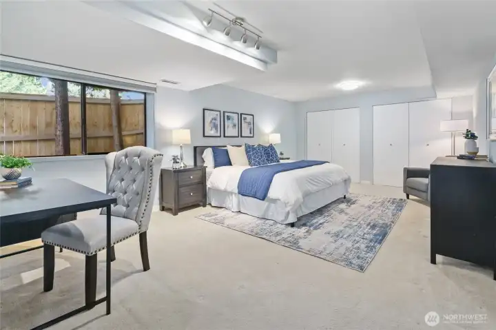 Lower level bedroom is HUGE (room for sitting area!) with 2 closets