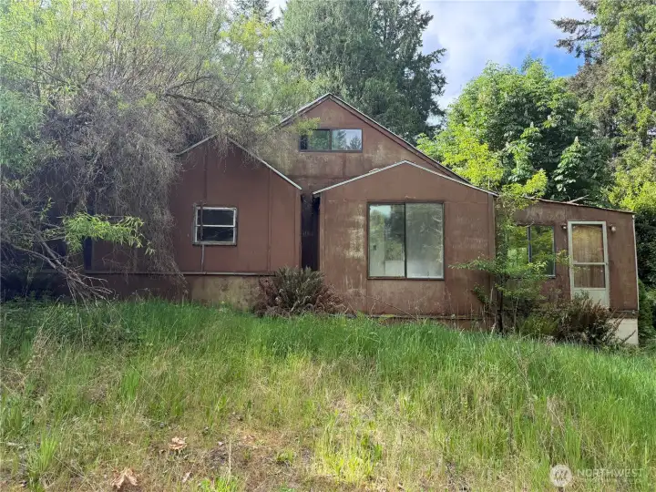 House on lot is unlivable.