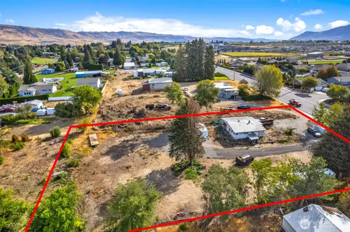 Drone view capturing the scale and versatility of this spacious double parcel with room for future possibilities.