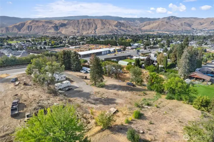 Wide aerial perspective showcasing land with exciting future residential and investment possibilities. Buyer to verify intended use.