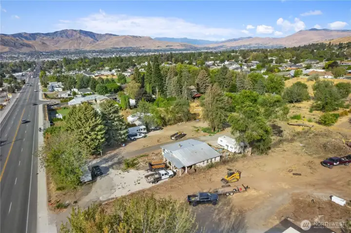 Wide aerial perspective showcasing land with exciting future residential and investment possibilities. Buyer to verify intended use.