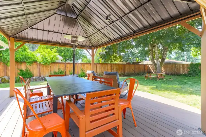 Newly installed covered outdoor living area featuring low-maintenance, durable composite decking.