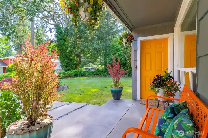 The front porch features an inviting and charming design, perfect for relaxation and curb appeal.