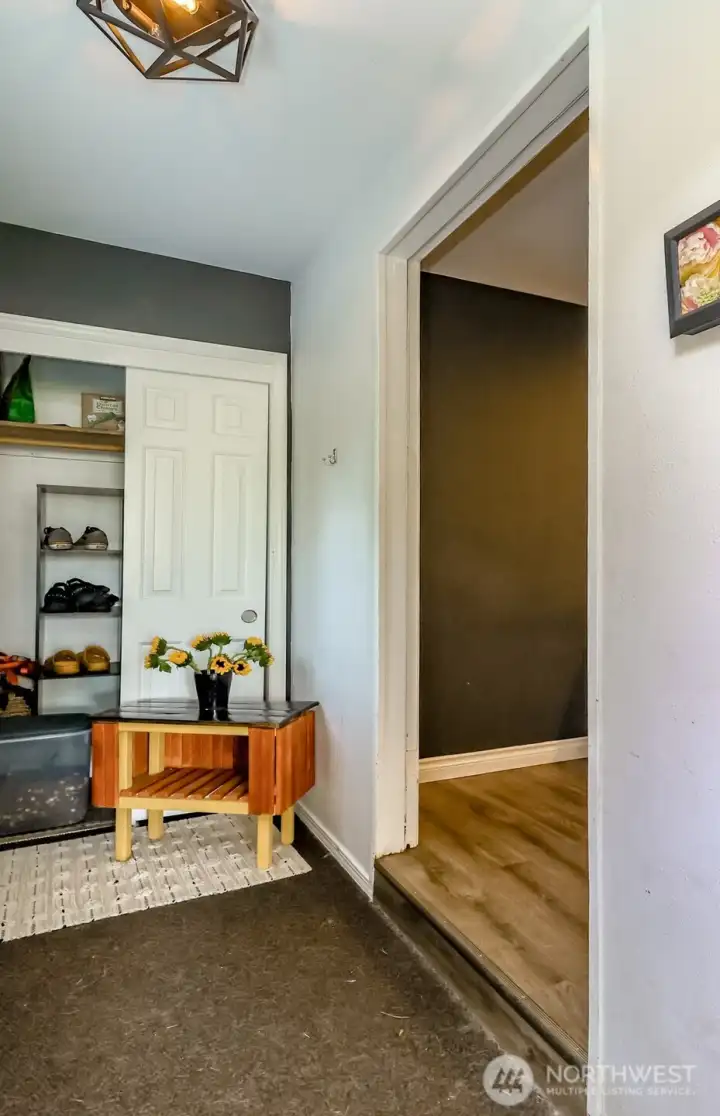 Mudroom entry featuring a spacious coat closet.