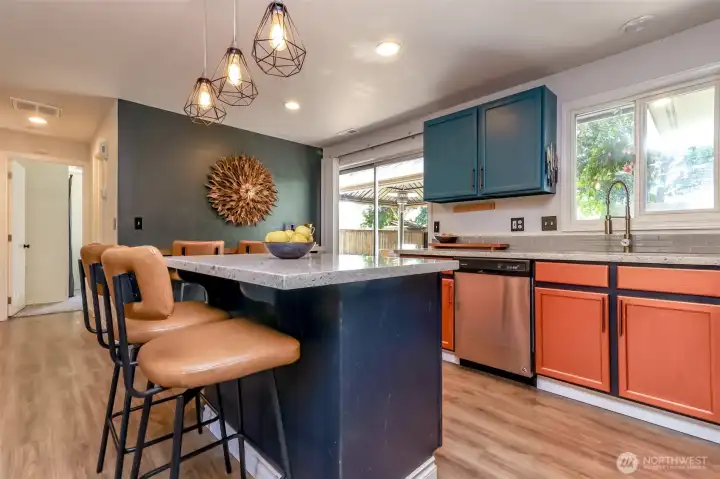 Another angle of this stunning kitchen. Bar stools are included if desired.