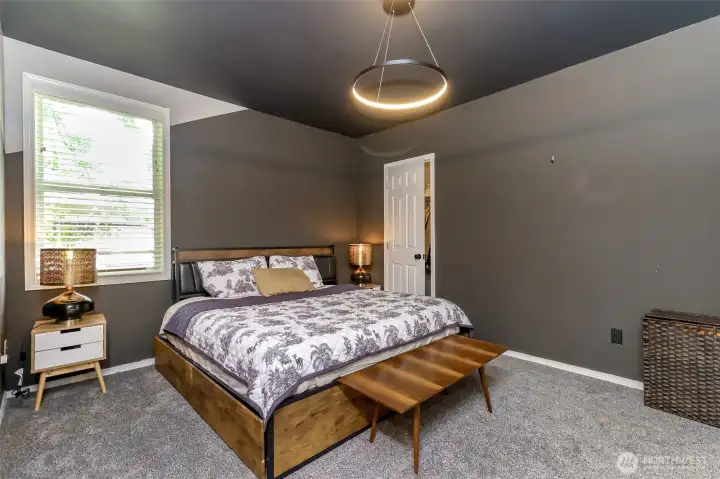 Primary Suite featuring a spacious walk-in closet.