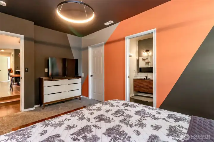 Huge primary suite with a gorgeous, brand-new bathroom. This place has tons of character and artistic style in every room!