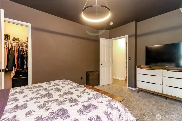 Primary Suite featuring a spacious walk-in closet.