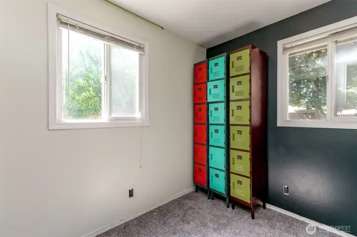 This is a versatile room that functions perfectly as a third bedroom or a dedicated home office.
