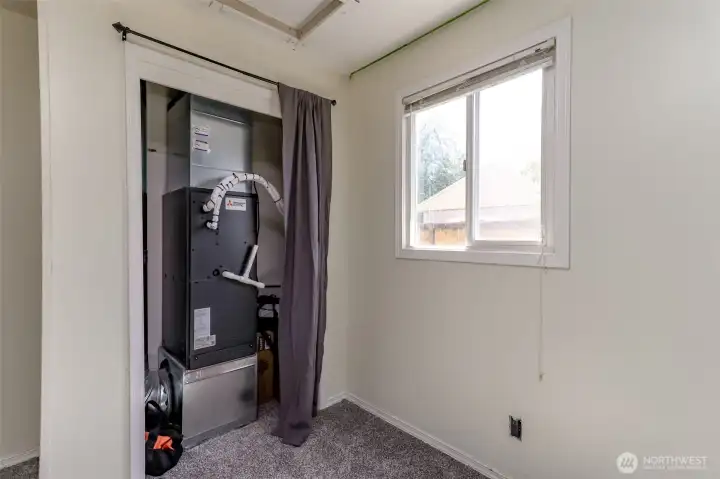 The third bedroom features the two-year-old furnace and air conditioning, perfect for staying cool on hot summer days.