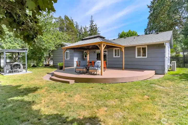 Newly installed covered outdoor living area featuring low-maintenance, durable composite decking.