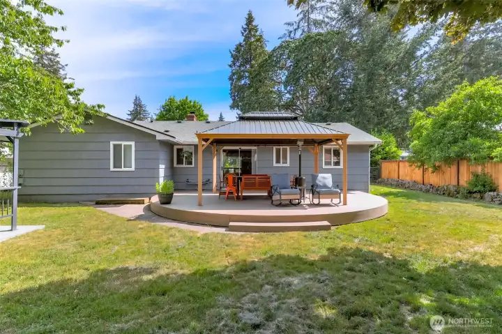 Newly installed covered outdoor living area featuring low-maintenance, durable composite decking.
