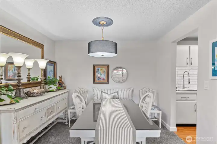 Dining area off kitchen open to living room