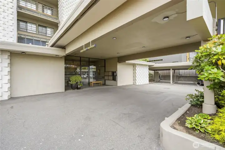 Covered entrance with secure lobby access and year-round weather protection Covered entrance with secure lobby access and year-round weather protection