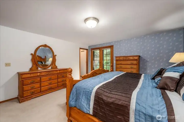 Primary with French doors to backyard