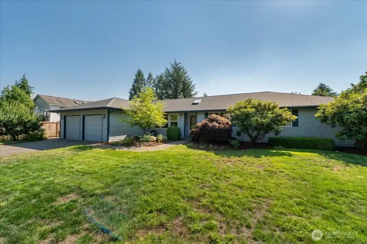 This front yard is very large and would be perfect for entertaining.