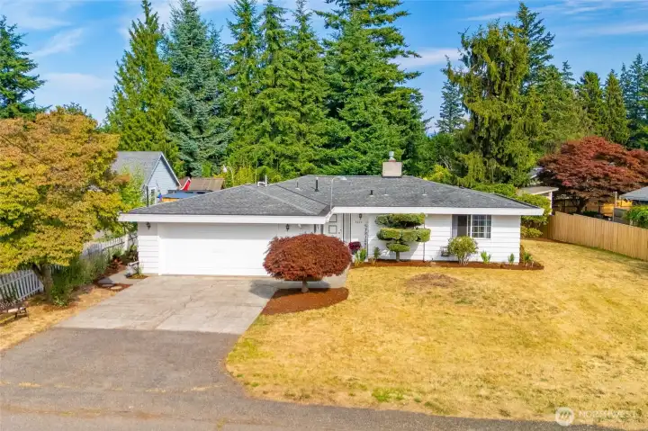 Welcome home to this charming rambler tucked into the Birchwood neighborhood.
