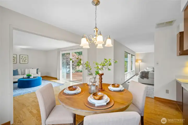Centrally located, the dining room connects both living areas.