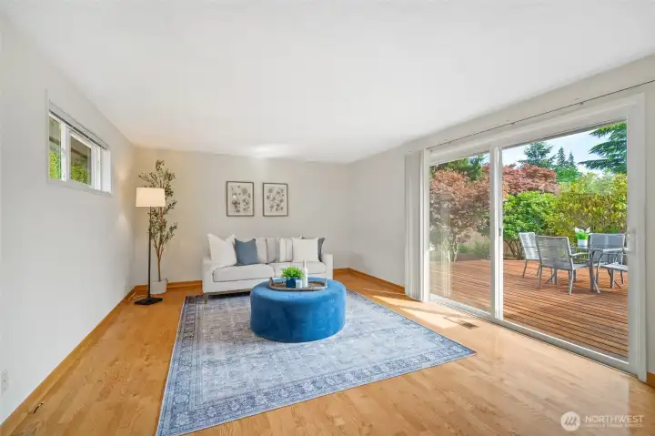 Off of the second family room area, the sliding doors open up to the exterior deck and serence backyard.