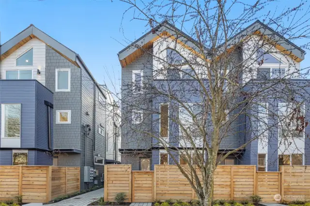 Welcome to your charming haven on Mary Avenue NW! This home greets you with a contemporary facade and inviting warmth tucked behind a stylishly fenced front yard.