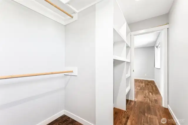 Dreamy walk-in closet with lots of storage space!