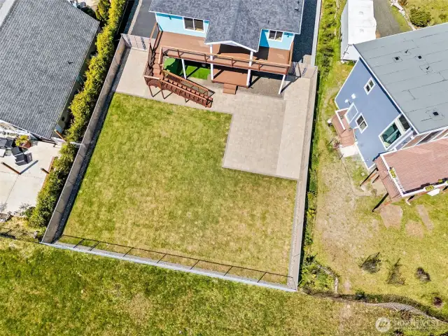 fully Fenced backyard with gate.