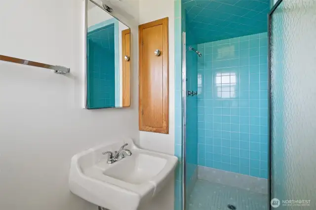 Primary bathroom features vintage tile shower - 3/4 bath