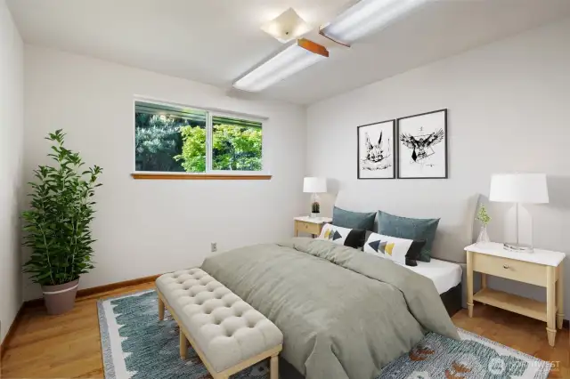 3rd Bedroom off the main hallway - Original hardwood floors. Virtually staged to show you the space.