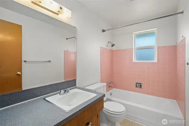 Main Hall Full bathroom with bathtub.