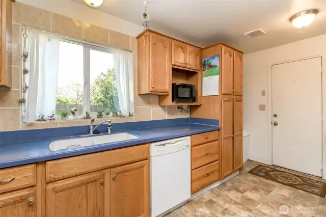 That door leads out to the backyard, perfect for get together