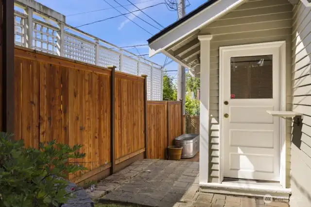 Just off the side of the kitchen, a convenient door leads straight out to the side deck.