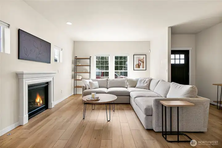 Enjoy brand-new LVP flooring throughout the home and a cozy gas fireplace—perfect for chilly nights.