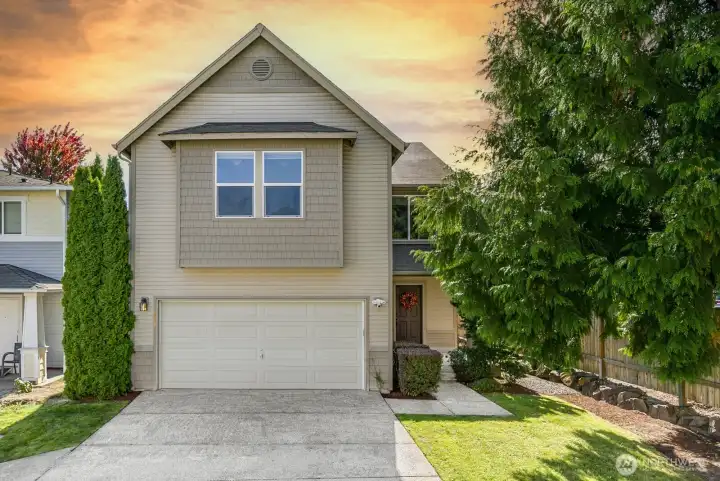 Ideal end of street location with large driveway and parking for 4 cars.