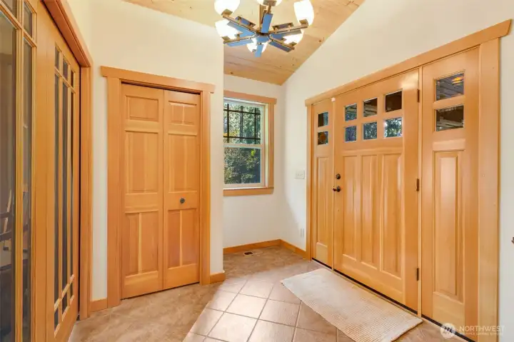 Inviting entry from the covered front porch with coat closet.