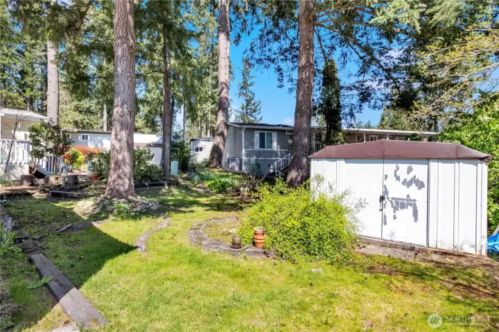 Backyard includes storage shed