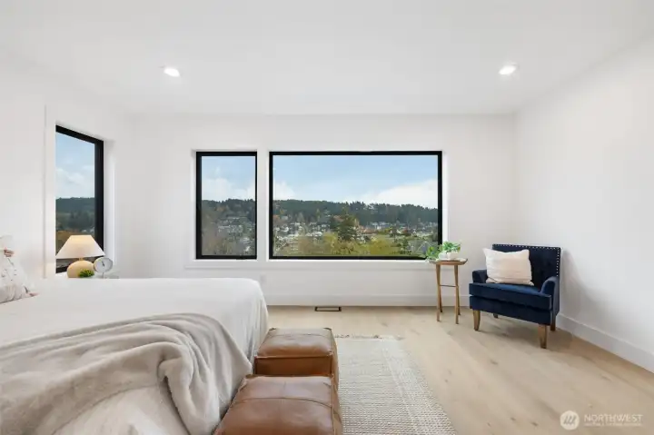 Primary bedroom with view.