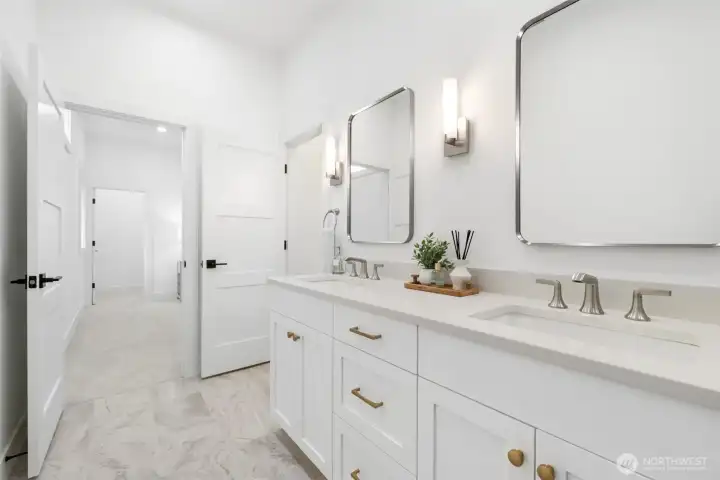 Guest suite sinks and cabinet.