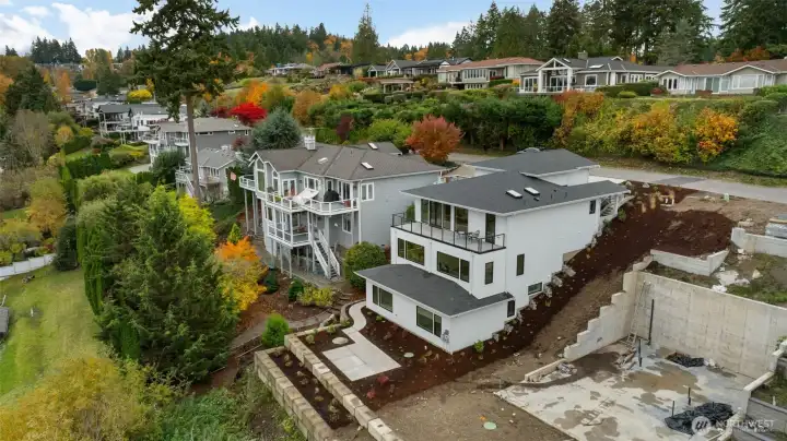 The foundation next to home is for a future home.  Potential to purchase lot or to have a home built.  Plans have been approved.