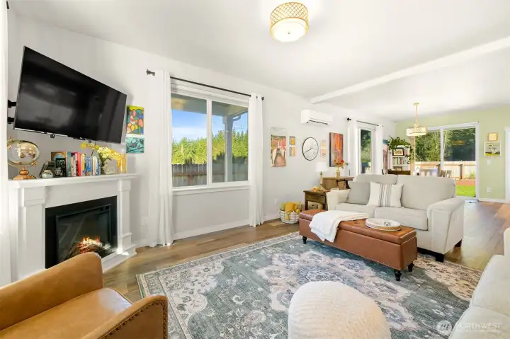 The corner fireplace is perfect for cozy snowy evenings.