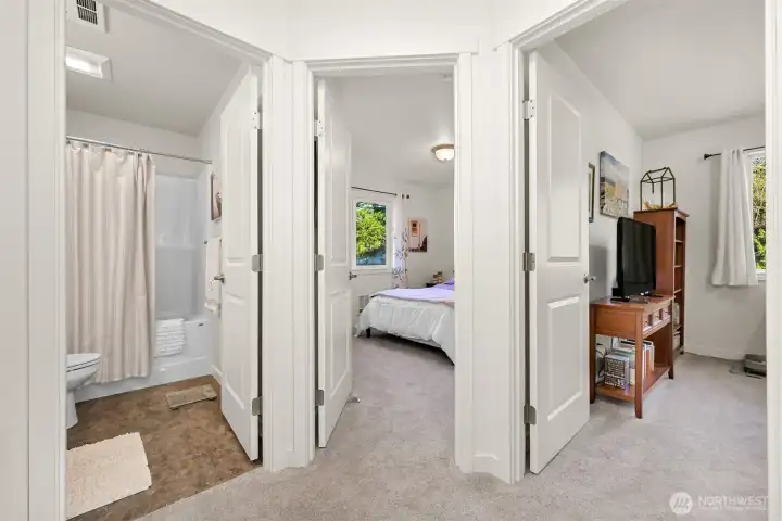 Landing at the top of the stairs leads to the guest bath, spare bedroom and office space.