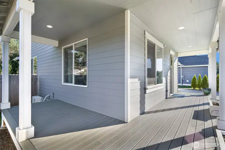 Huge wrap around front and side porch perfect for a rocking chair.