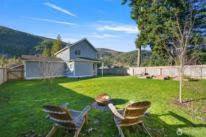 Fully fenced backyard provides tons of privacy and room for hanging out.