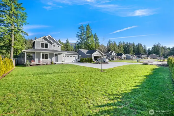 Spacious front yard with beautiful landscaping