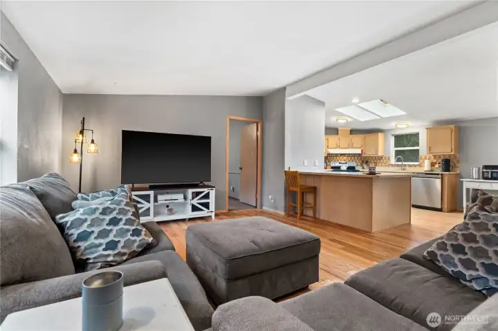 Nice hardwood floors in the main living space and 2 skylights in the kitchen create a light flowing open concept.