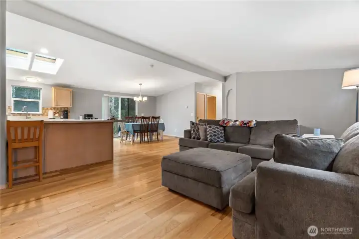 Down the hallways to the right are the 2 additional bedrooms, full bathroom, and separate laundry room.